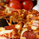 Illustration for article titled Pizza Chains Are Secretly Packing Their Food with MSG